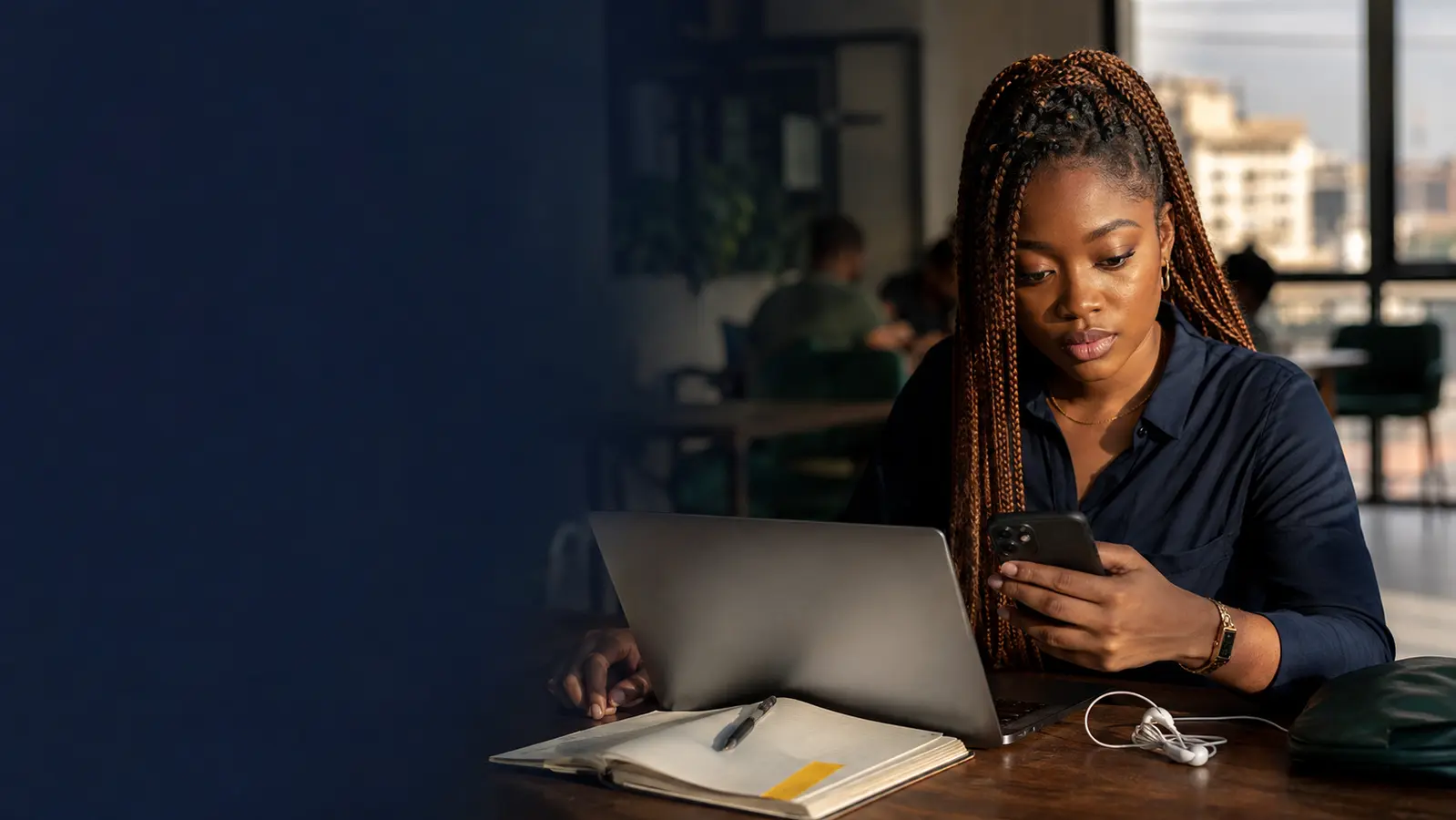 An African professional using digital tools to improve real work